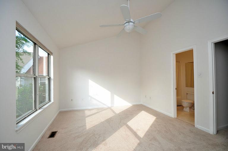 9537 Clocktower Lane Columbia, MD 21046 - Photo 13 of 16 a view of an empty room and window