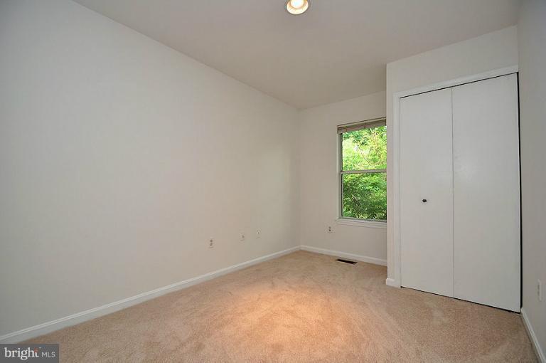 9537 Clocktower Lane Columbia, MD 21046 - Photo 14 of 16 a view of an empty room with a window