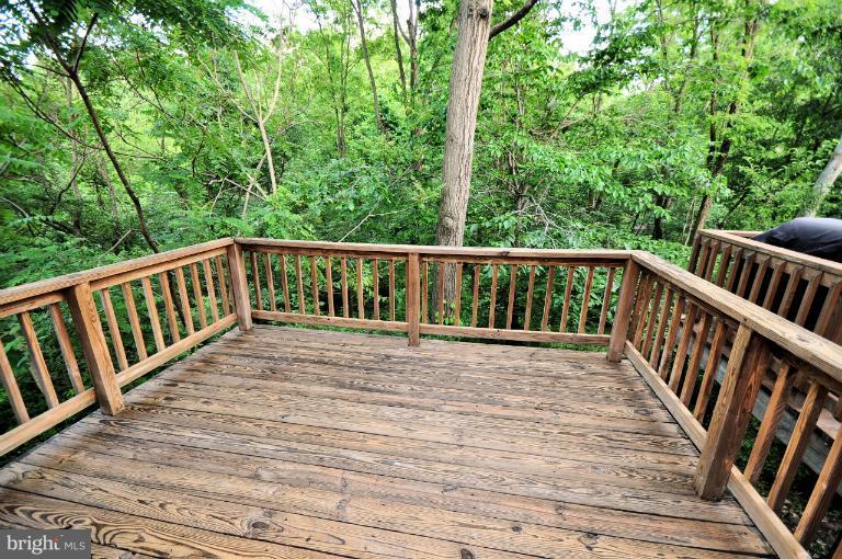 9537 Clocktower Lane Columbia, MD 21046 - Photo 15 of 16 a balcony with wooden floor
