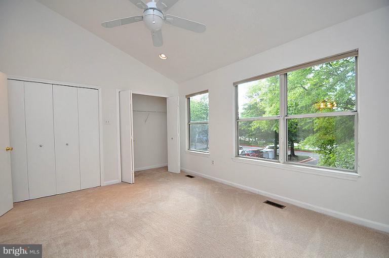 9537 Clocktower Lane Columbia, MD 21046 - Photo 3 of 16 a view of an empty room with a window