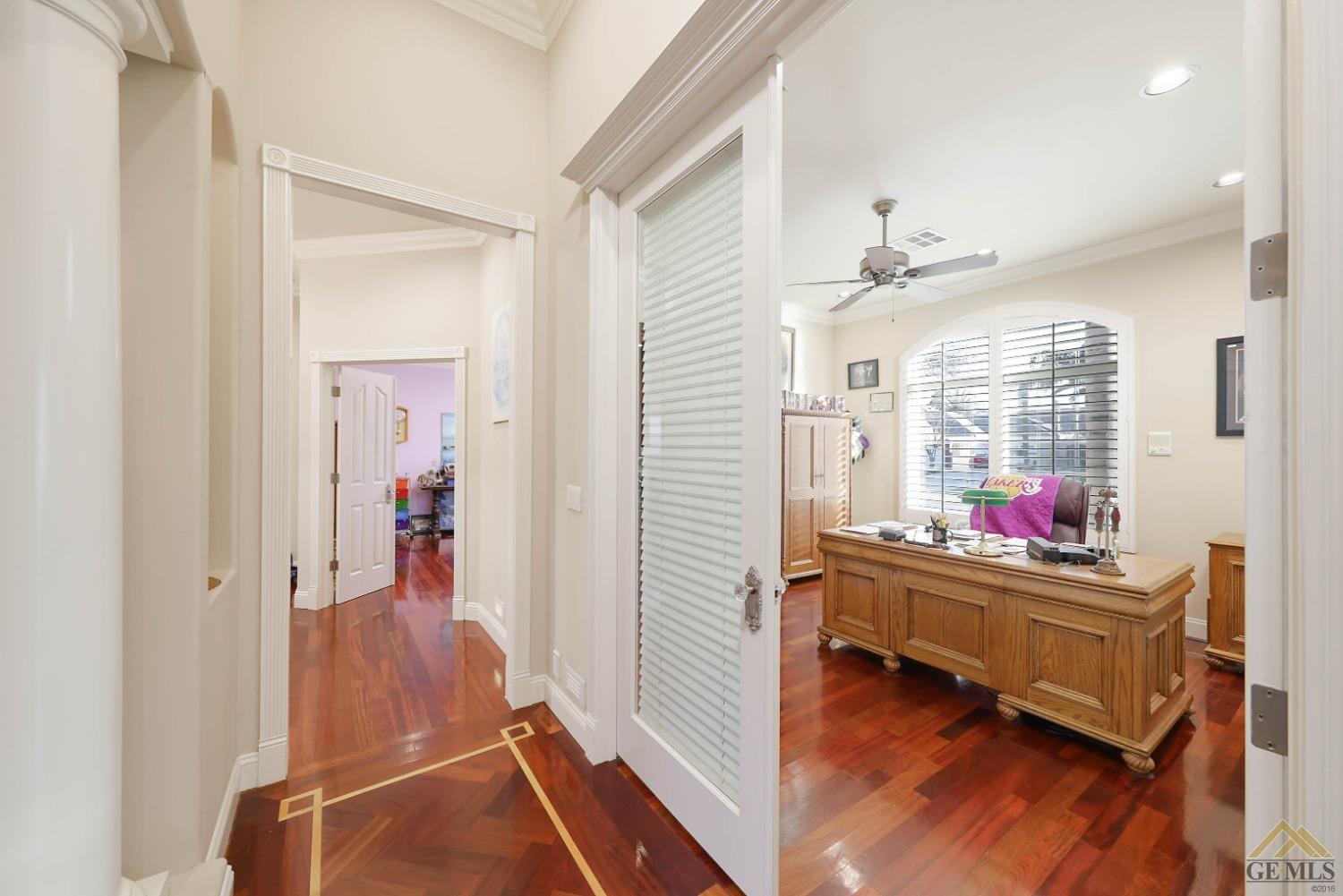 Undisclosed Address Bakersfield, CA 93312 - Photo 17 of 48 a room that has a bed and a mirror