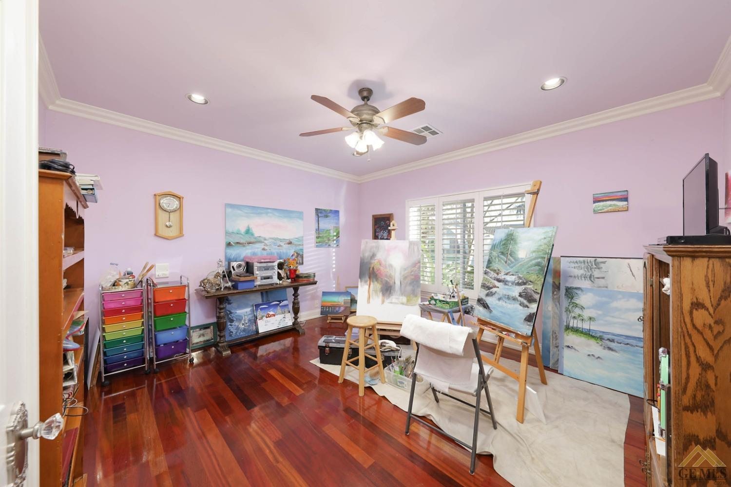 Undisclosed Address Bakersfield, CA 93312 - Photo 21 of 48 a living room with furniture and wooden floor
