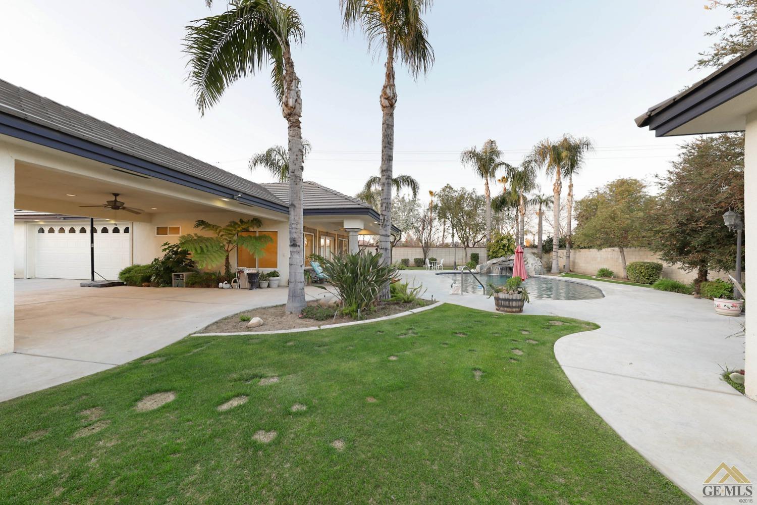Undisclosed Address Bakersfield, CA 93312 - Photo 28 of 48 a view of a swimming pool with a patio