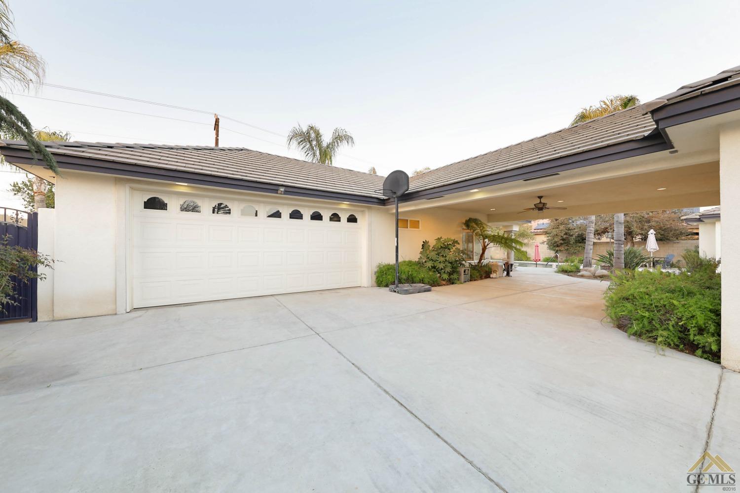 Undisclosed Address Bakersfield, CA 93312 - Photo 30 of 48 a view of a street with a building in the background