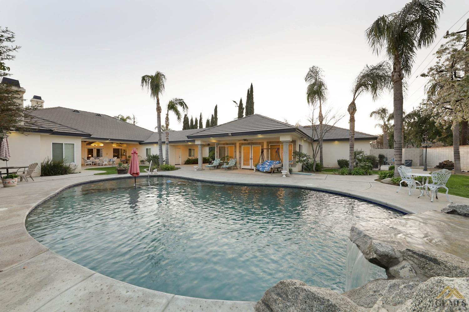 Undisclosed Address Bakersfield, CA 93312 - Photo 38 of 48 a view of a house with swimming pool