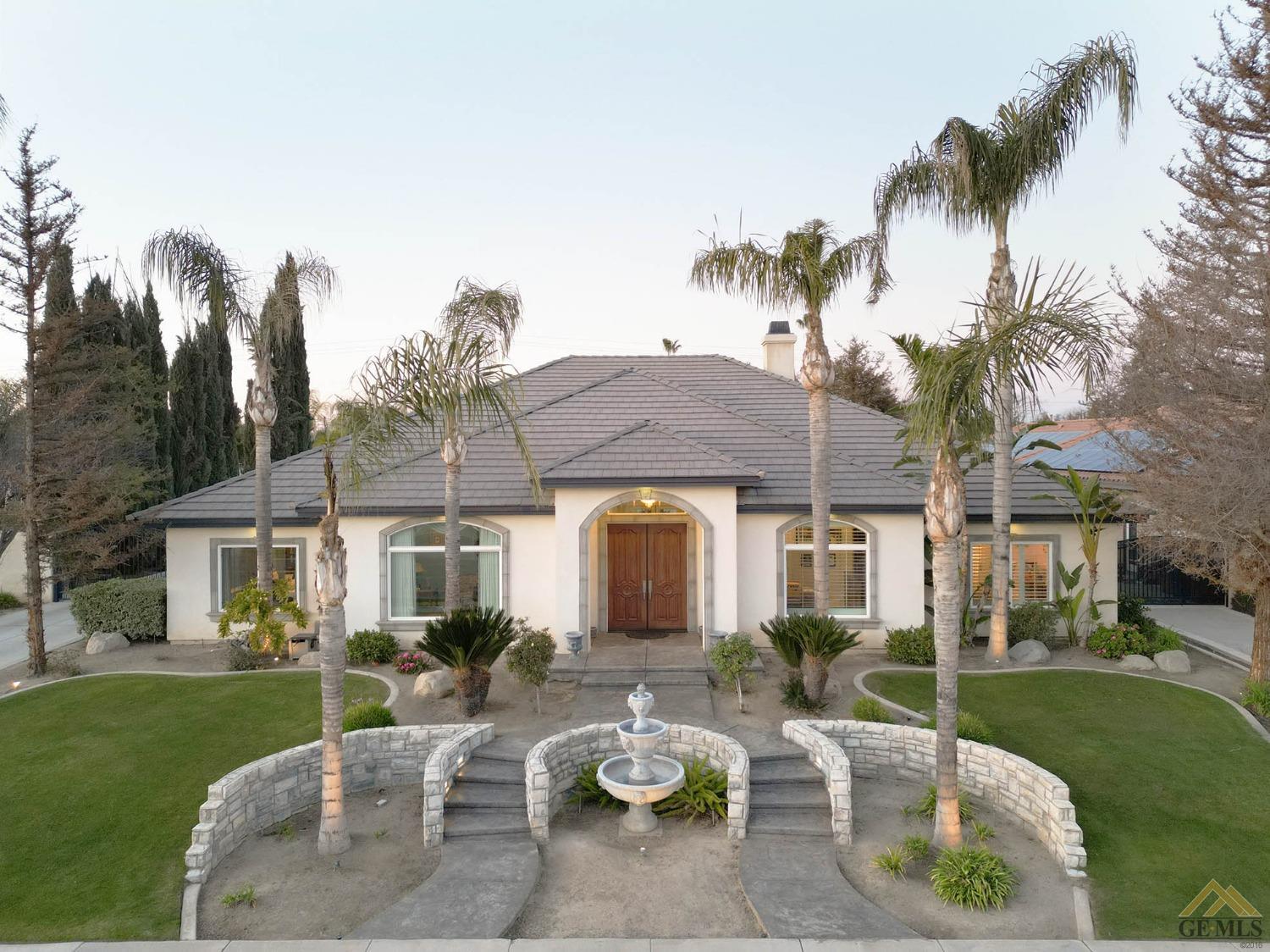 Undisclosed Address Bakersfield, CA 93312 - Photo 43 of 48 front view of a house with a yard