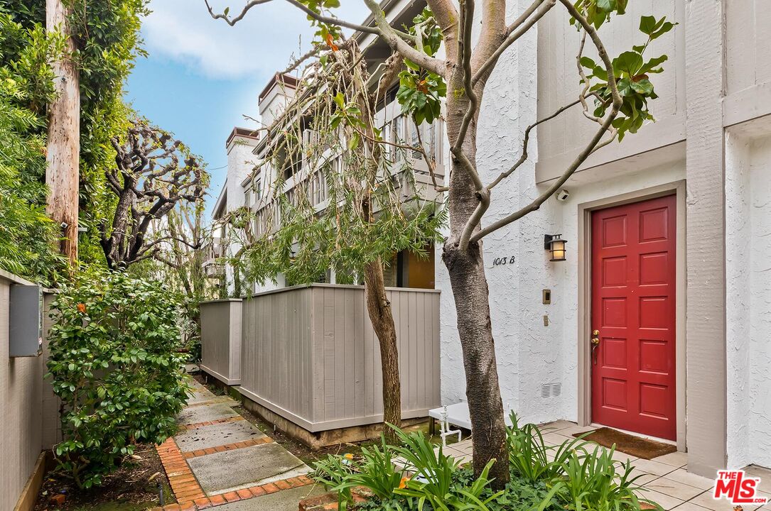 1013 21st Street, Unit B Santa Monica, CA 90403 - Photo 1 of 28 a couple of potted plants in front of door