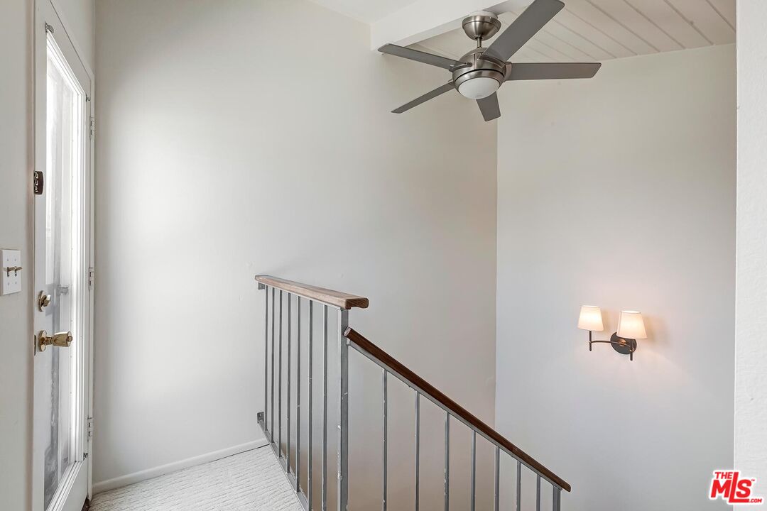 1013 21st Street, Unit B Santa Monica, CA 90403 - Photo 22 of 28 a view of a hallway with a window