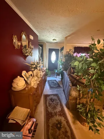 a view of a balcony with furniture