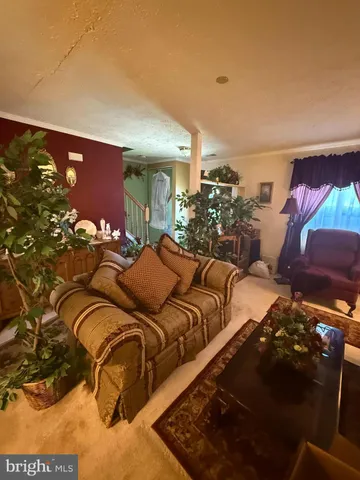 a bedroom with bed and a night stand