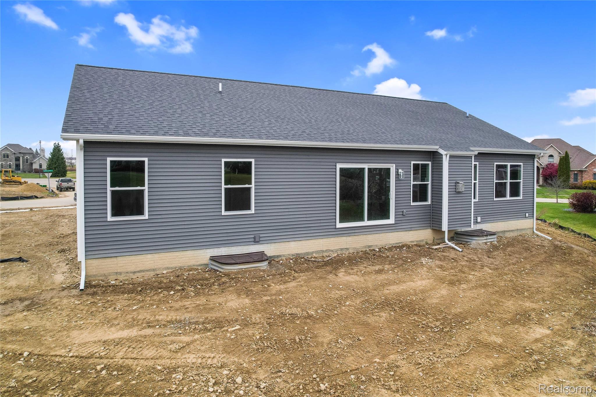 9033 Copper Ridge Drive Davison, MI 48423 - Photo 28 of 29 Rear view of property with a shingled roof