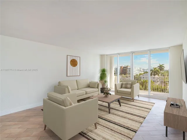 a living room with furniture and a table