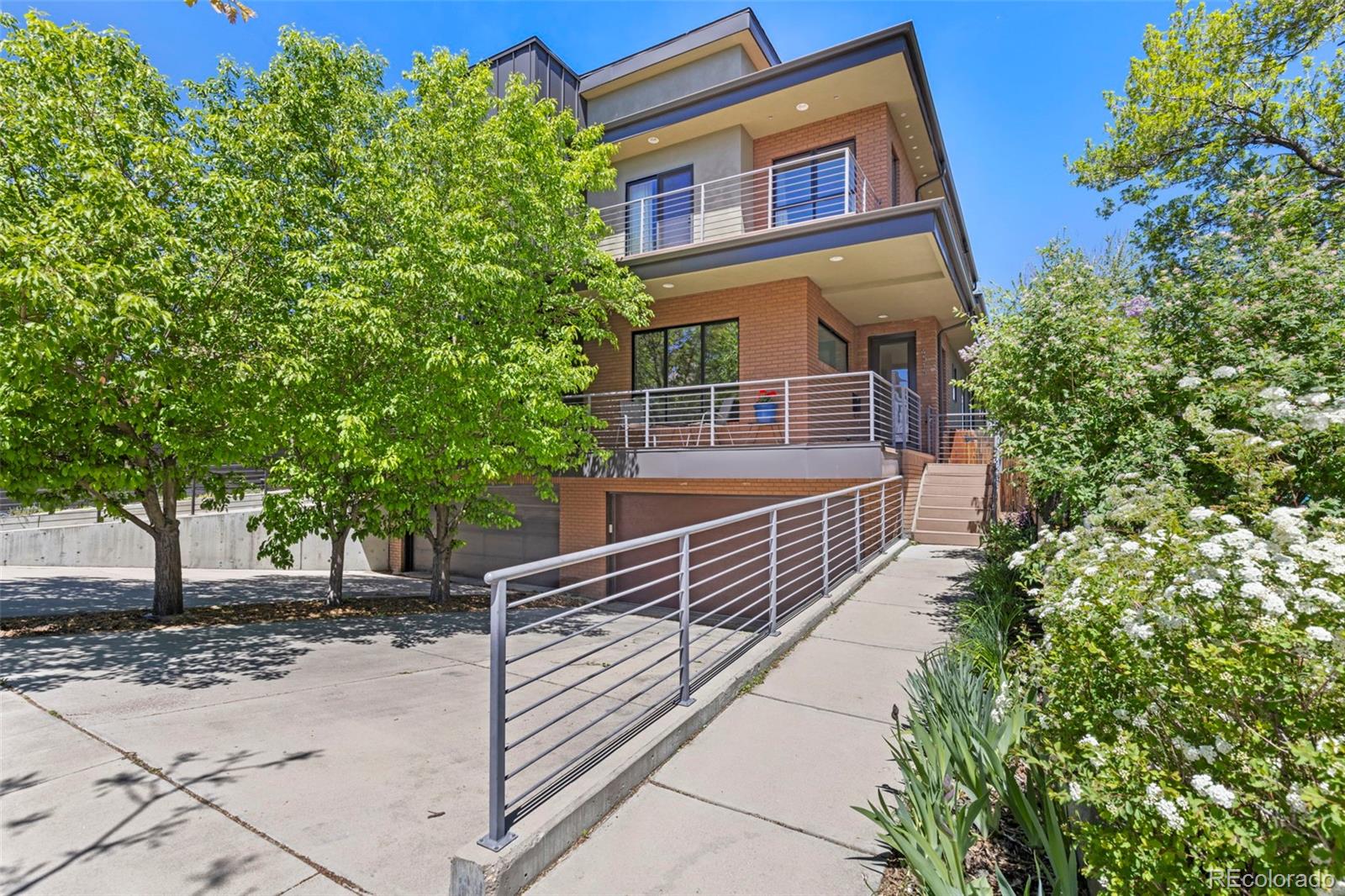 4515 West Moncrieff Place Denver, CO 80212 - Photo 2 of 29 a view of a house with a tree