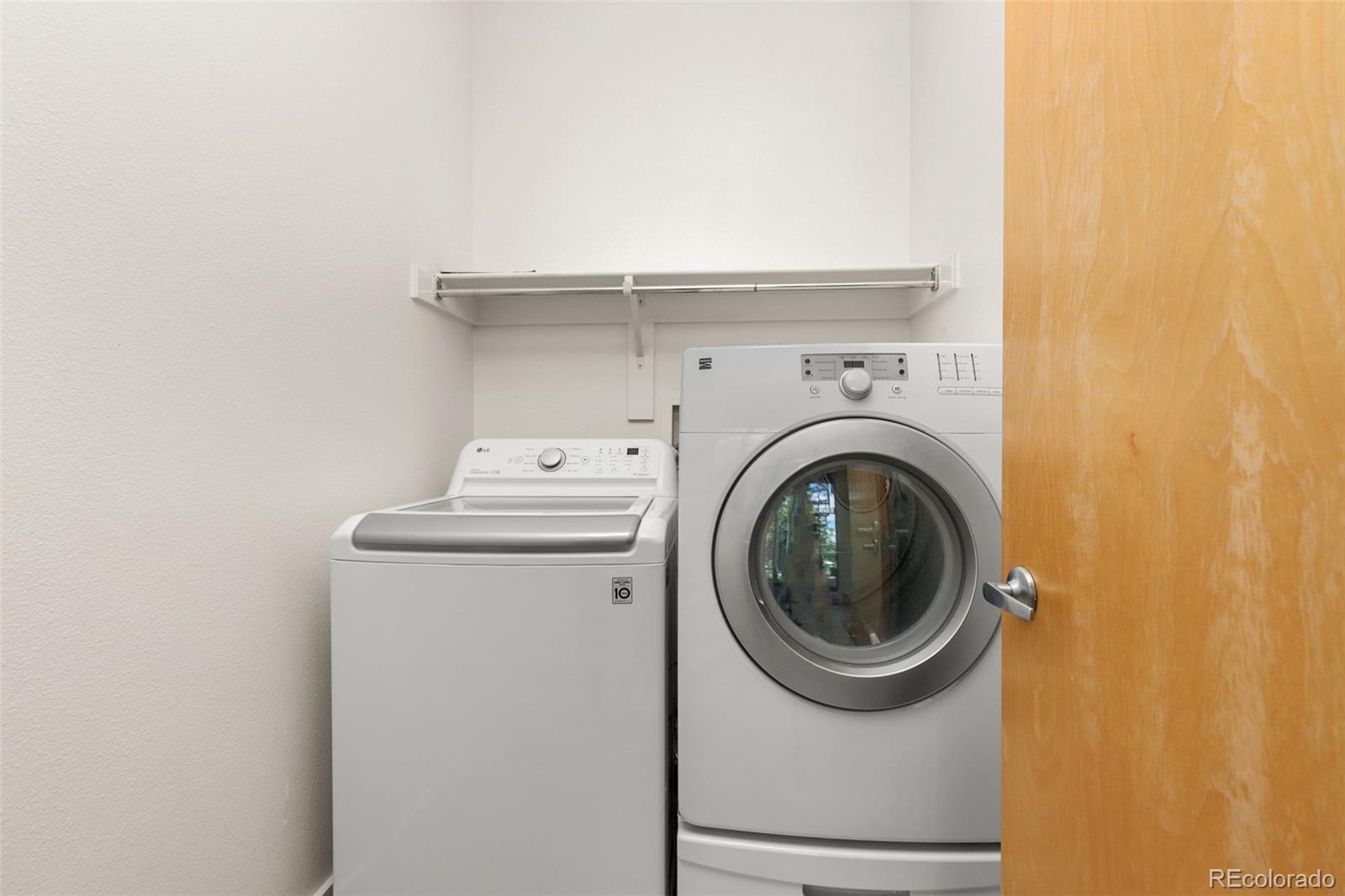 4515 West Moncrieff Place Denver, CO 80212 - Photo 21 of 29 a utility room with dryer and washer