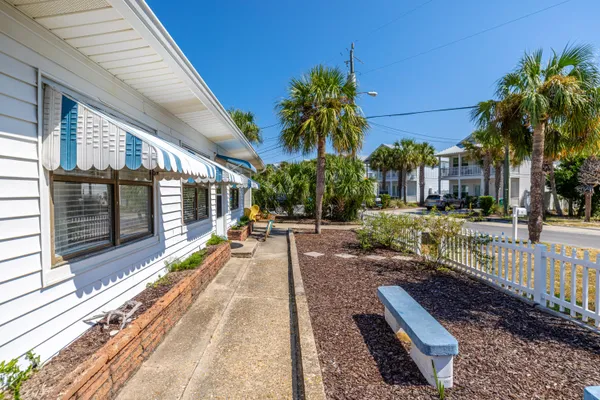 a view of yard with patio