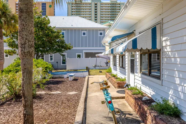 a backyard of a house with seating space