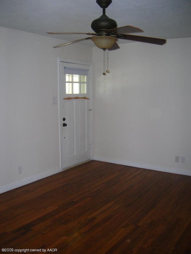 4116 South Lipscomb Street Amarillo, TX 79110 - Photo 2 of 10 a view of an empty room with a window