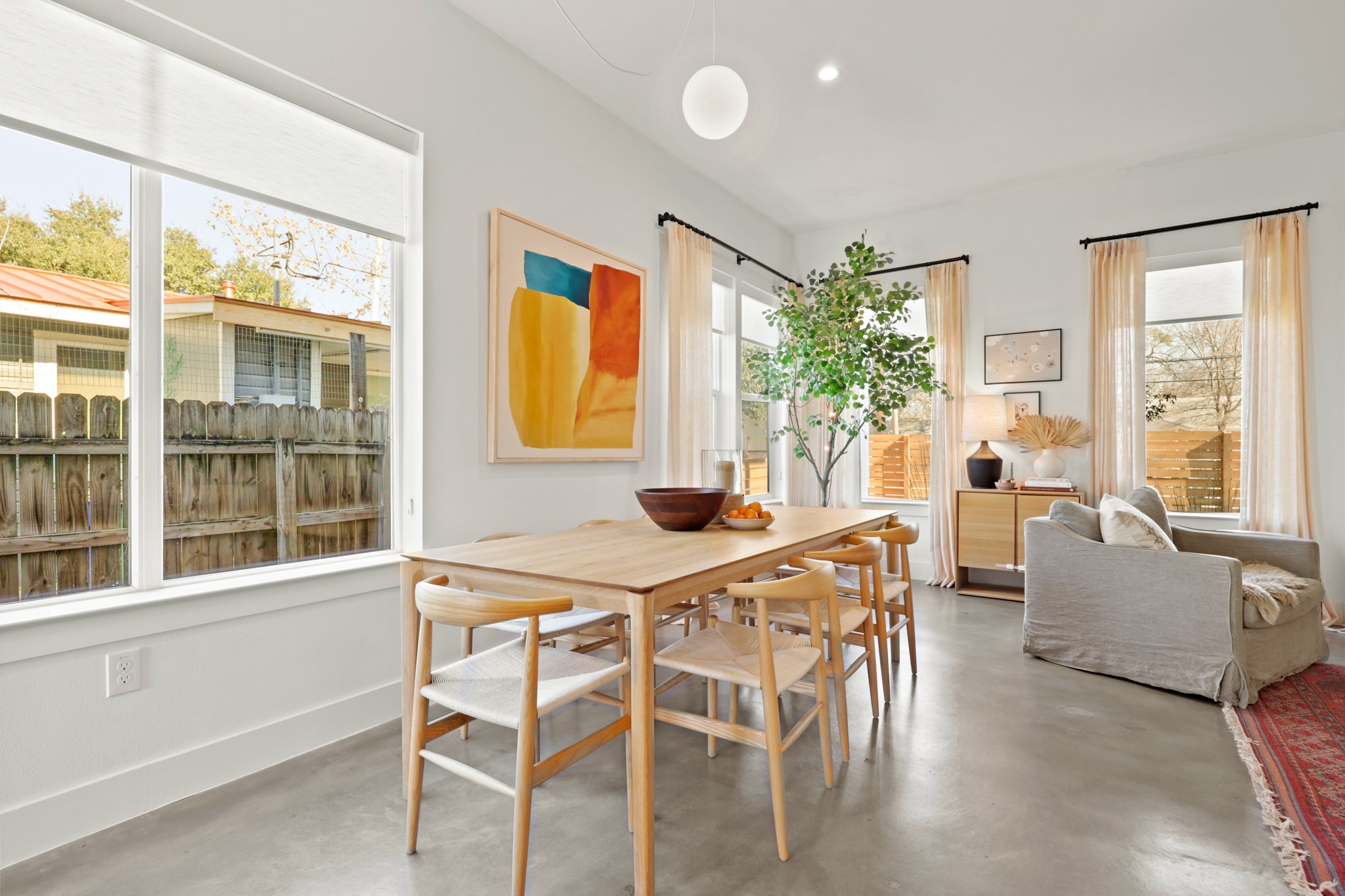 1102 1/2 Tillery Street, Unit 1 Austin, TX 78702 - Photo 11 of 38 a dining room with furniture and window