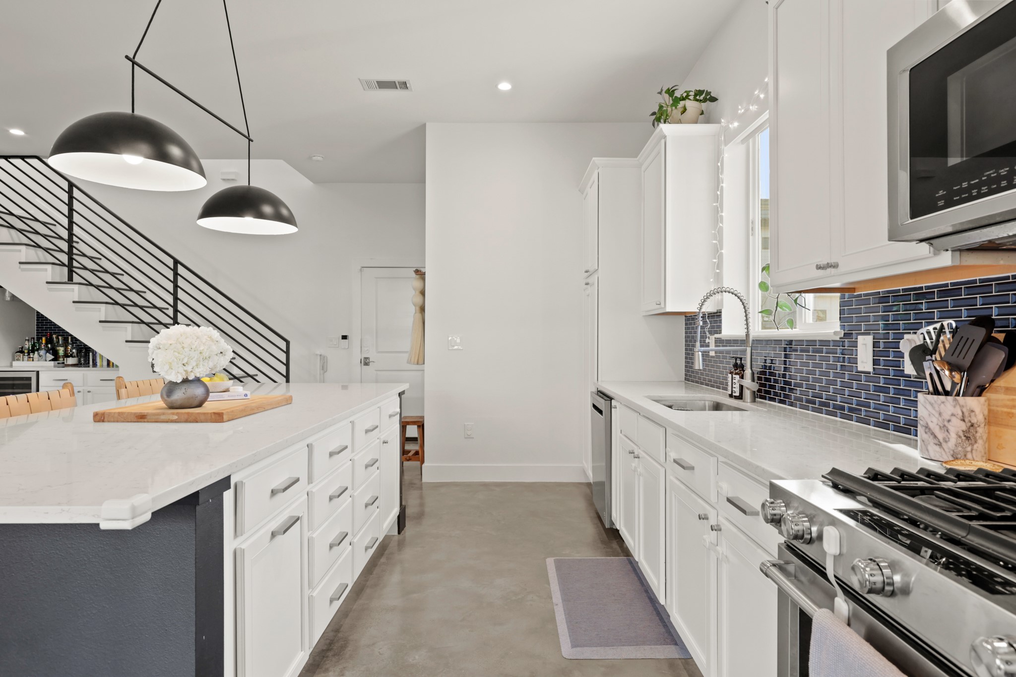 1102 1/2 Tillery Street, Unit 1 Austin, TX 78702 - Photo 13 of 38 a kitchen with appliances and cabinets