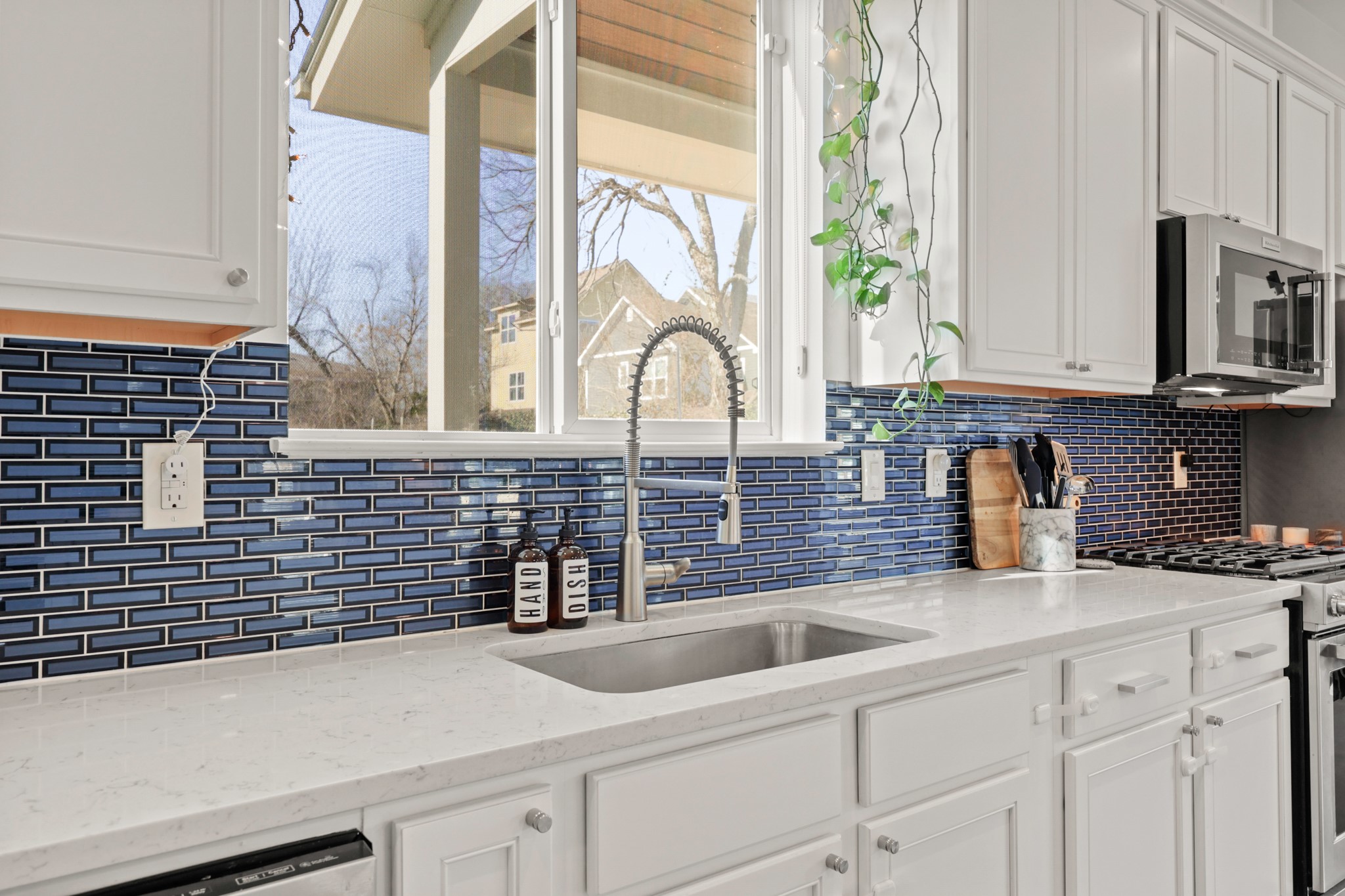 1102 1/2 Tillery Street, Unit 1 Austin, TX 78702 - Photo 16 of 38 a kitchen with a sink and a window