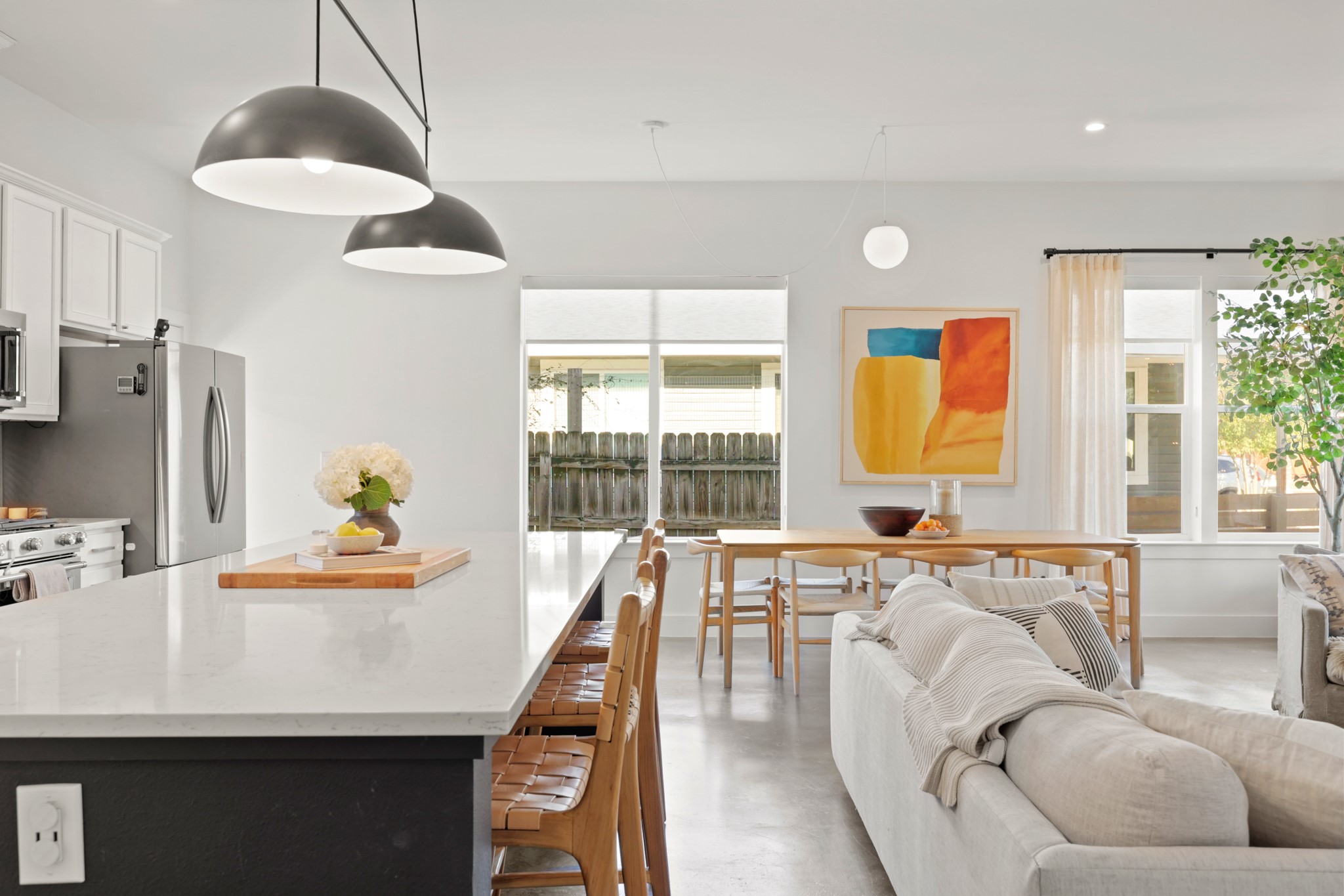 1102 1/2 Tillery Street, Unit 1 Austin, TX 78702 - Photo 17 of 38 a living room with furniture and a large window