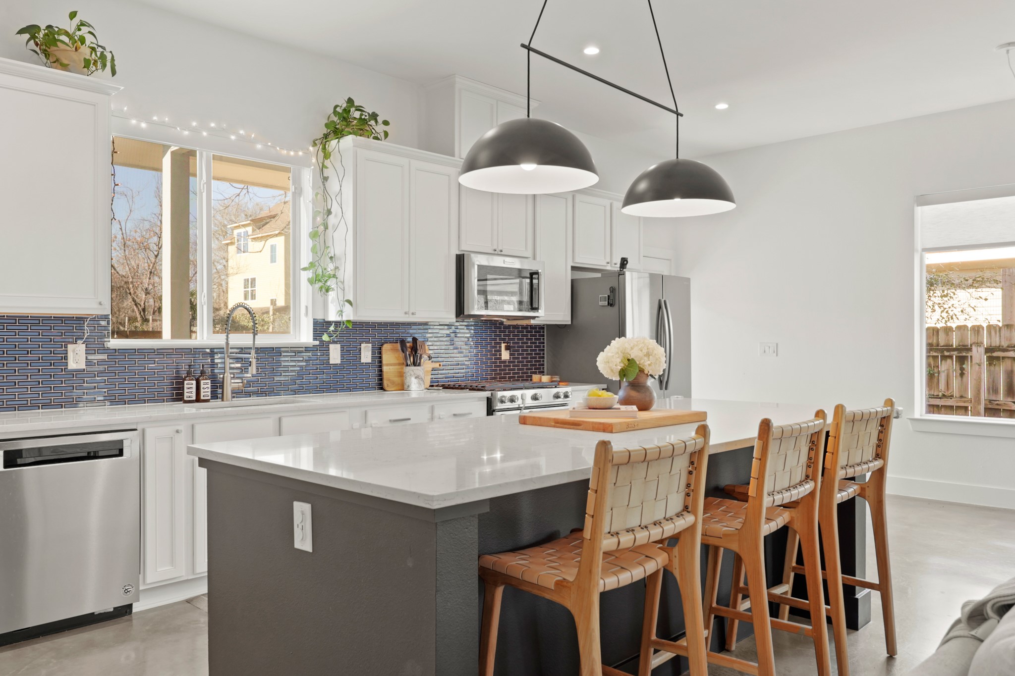 1102 1/2 Tillery Street, Unit 1 Austin, TX 78702 - Photo 18 of 38 a kitchen with a dining table and chairs