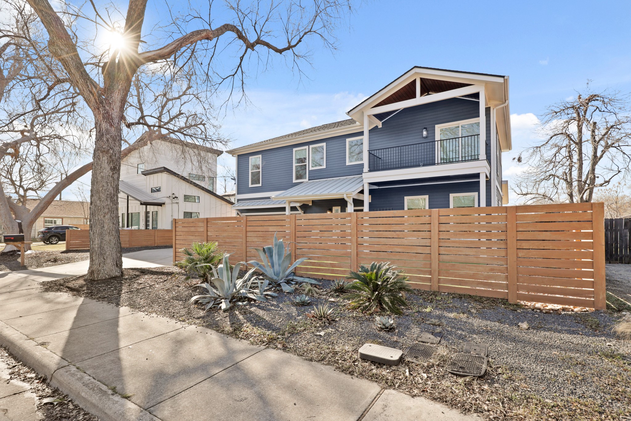 1102 1/2 Tillery Street, Unit 1 Austin, TX 78702 - Photo 2 of 38 a front view of a house with garden