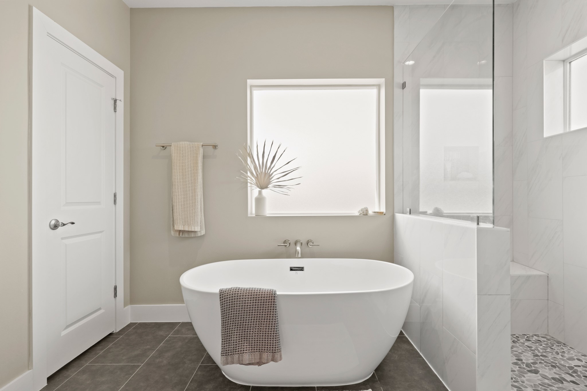 1102 1/2 Tillery Street, Unit 1 Austin, TX 78702 - Photo 23 of 38 a bathroom with a bathtub and a window
