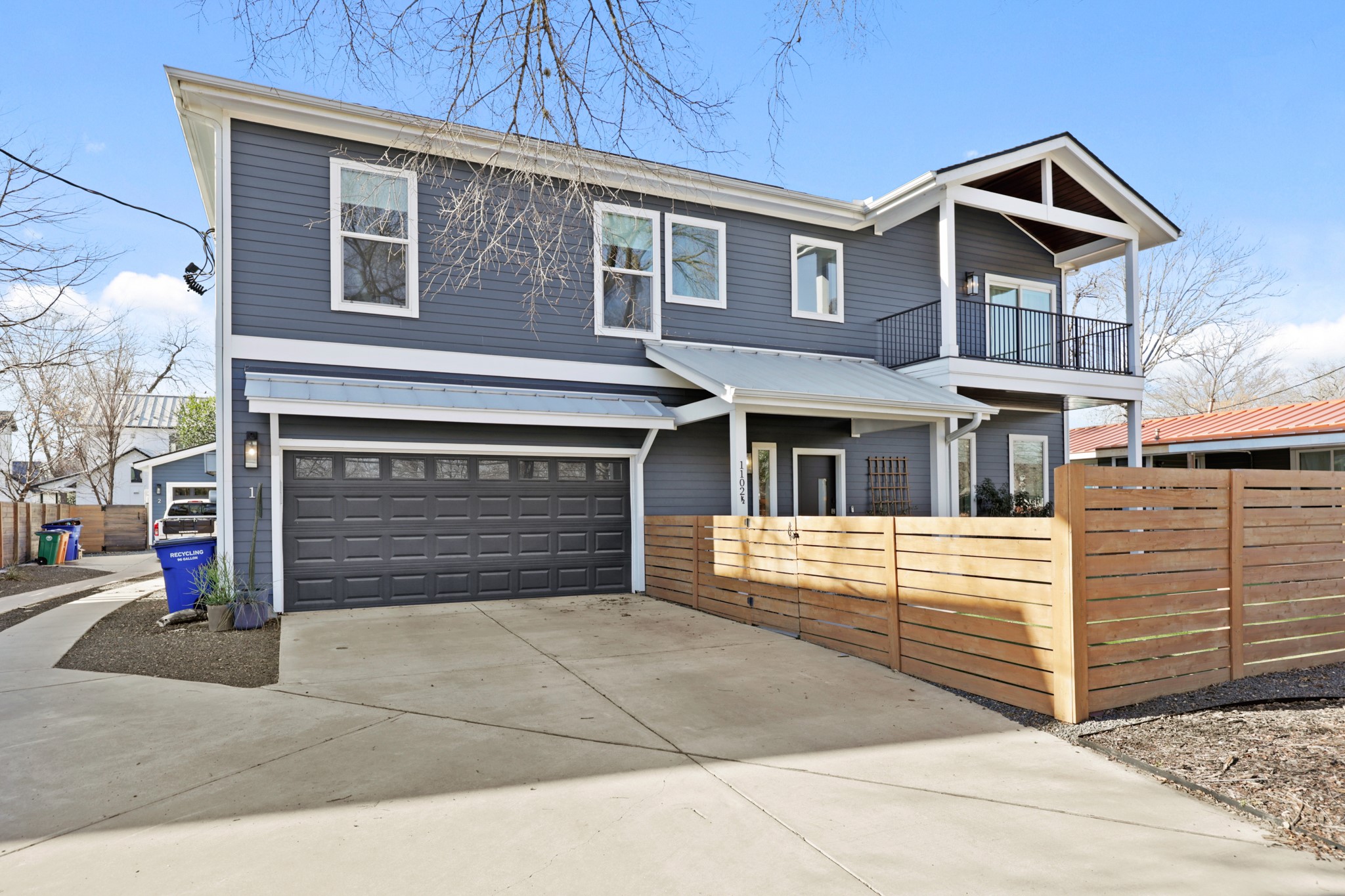 1102 1/2 Tillery Street, Unit 1 Austin, TX 78702 - Photo 3 of 38 a front view of a house with a yard