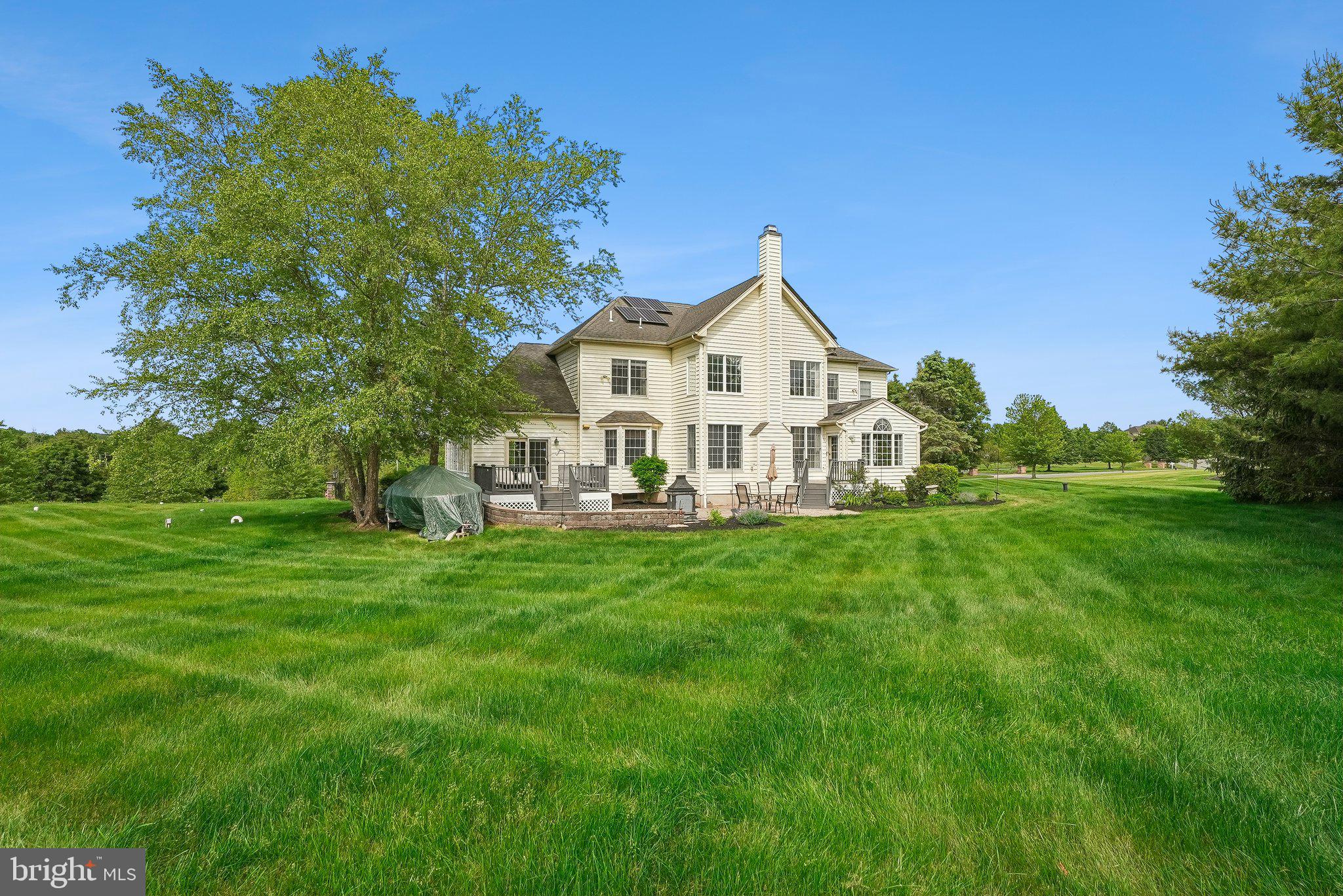 1 Baker Way Pennington, NJ 08534 - Photo 76 of 77 a view of a house with a big yard