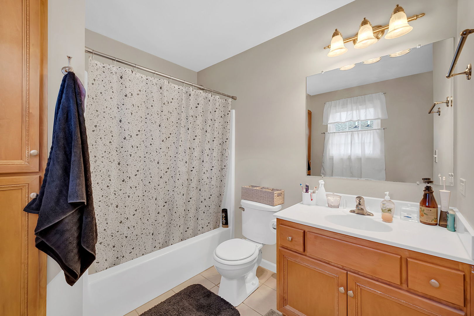 220 South Will Road, Unit 2 Diamond, IL 60416 - Photo 17 of 26 a bathroom with a sink a toilet and shower