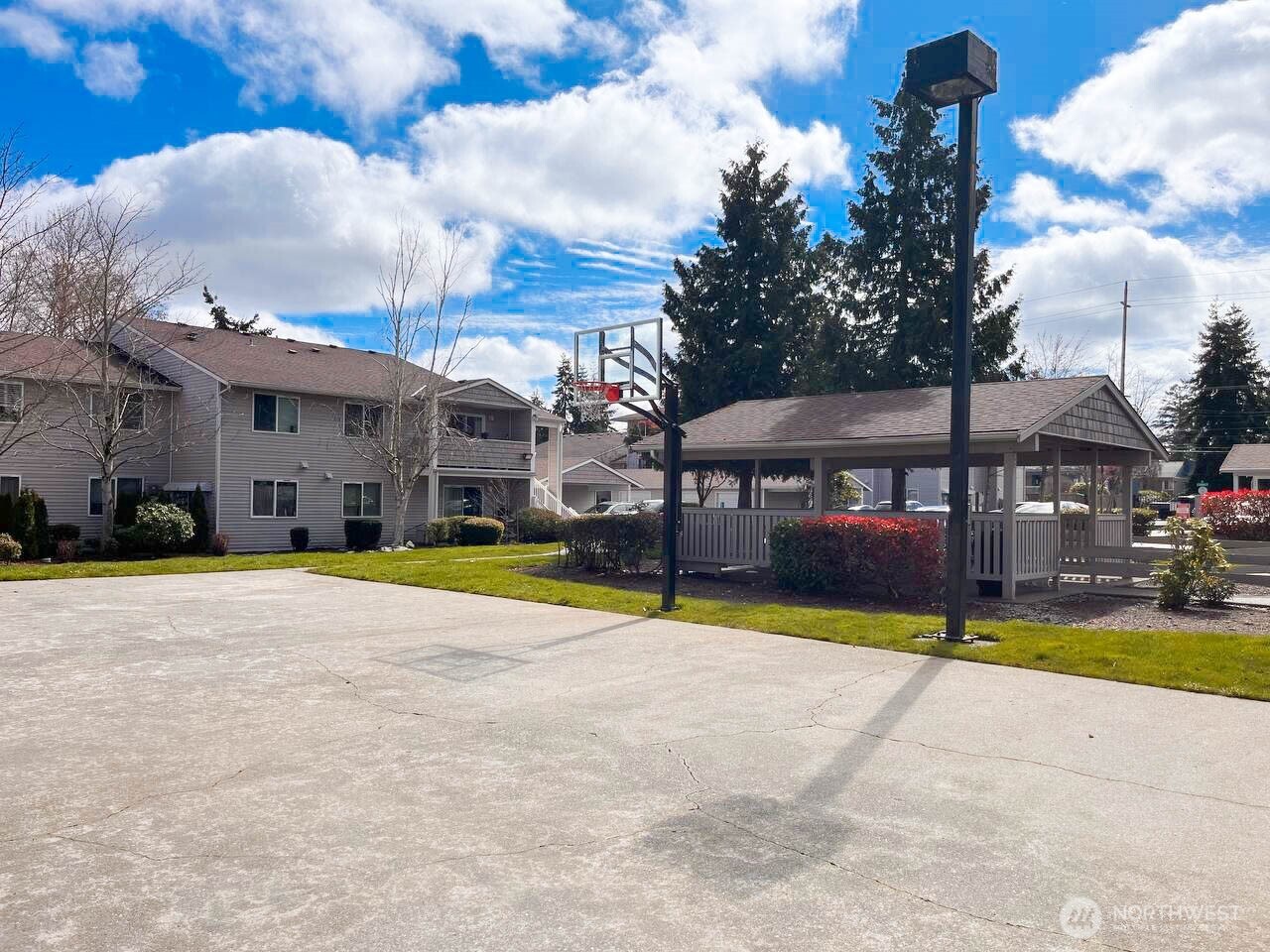 1001 West Casino Road, Unit G303 Everett, WA 98204 - Photo 22 of 22 a view of swimming pool with outdoor seating and a yard