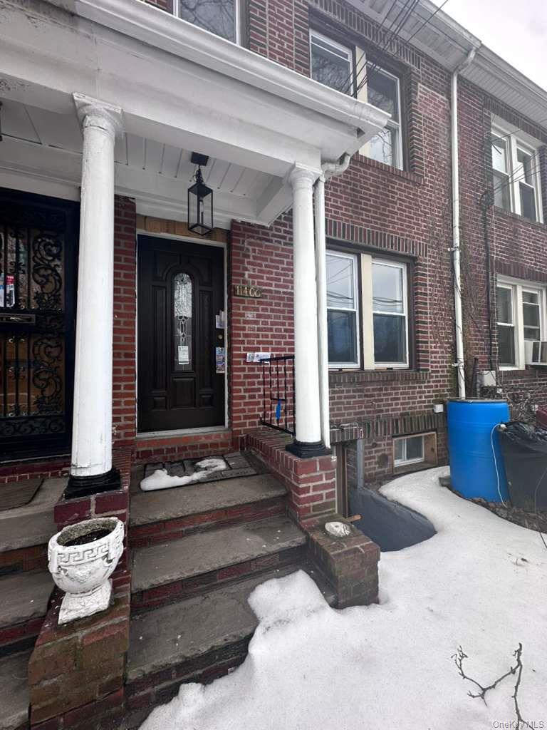 114-06 Inwood Street Queens, NY 11436 - Photo 1 of 18 Property entrance with a porch and brick siding