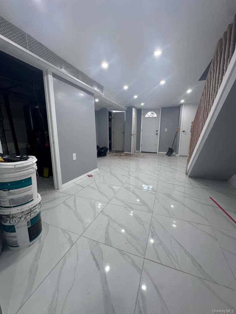 114-06 Inwood Street Queens, NY 11436 - Photo 12 of 18 Finished basement with recessed lighting