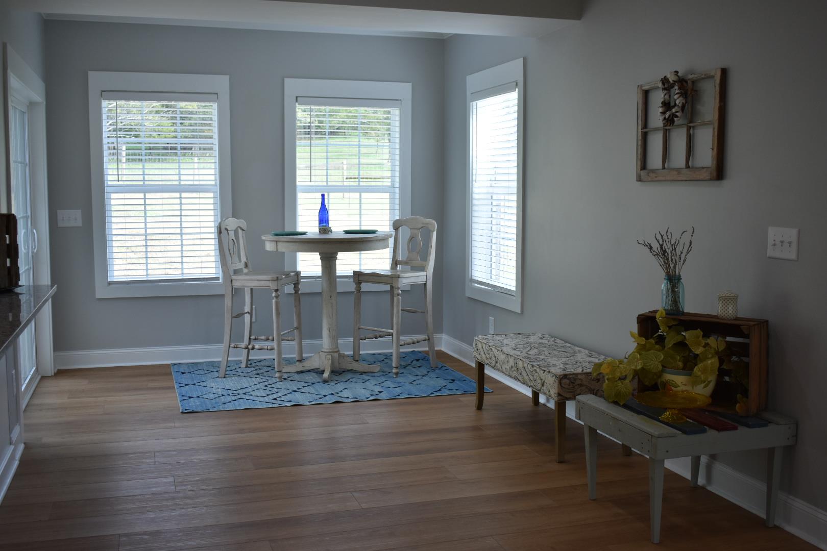 2107 Double Branch Road Columbia, TN 38401 - Photo 11 of 29 a dining room with table chairs and wooden floor