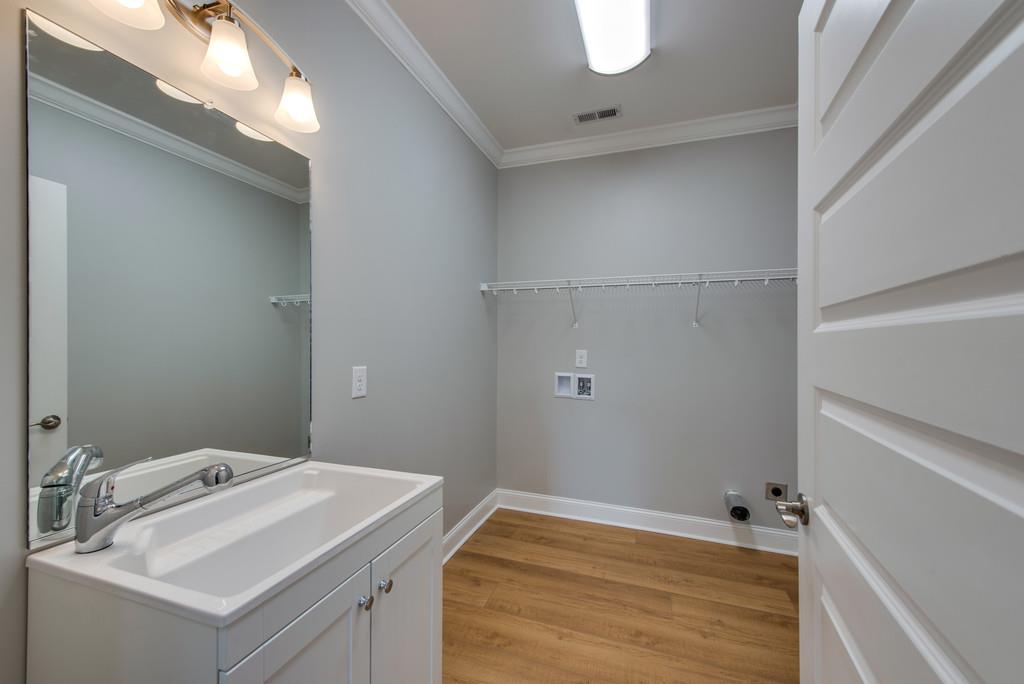 2107 Double Branch Road Columbia, TN 38401 - Photo 13 of 29 a bathroom with a sink and vanity