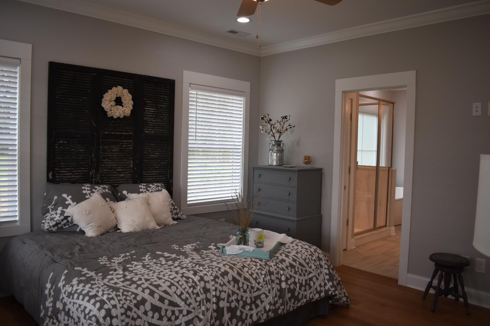 2107 Double Branch Road Columbia, TN 38401 - Photo 15 of 29 a bedroom with a bed and wooden floor