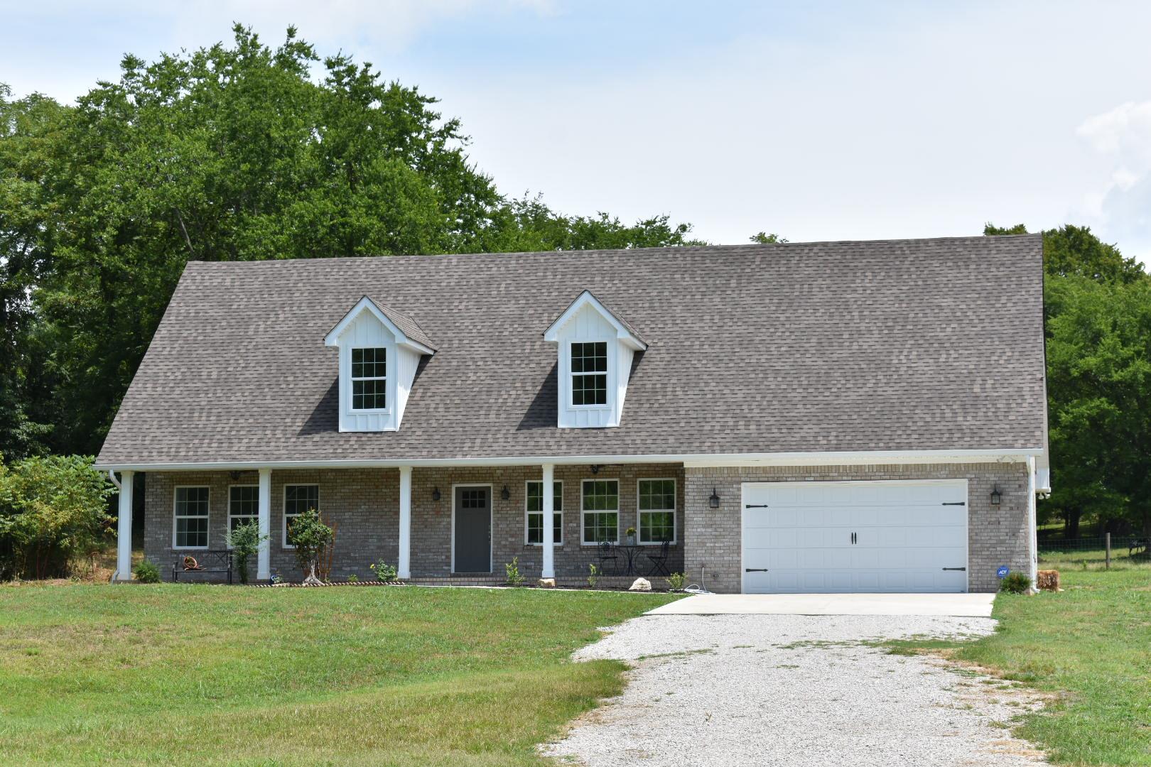 2107 Double Branch Road Columbia, TN 38401 - Photo 2 of 29 front view of a house with a yard