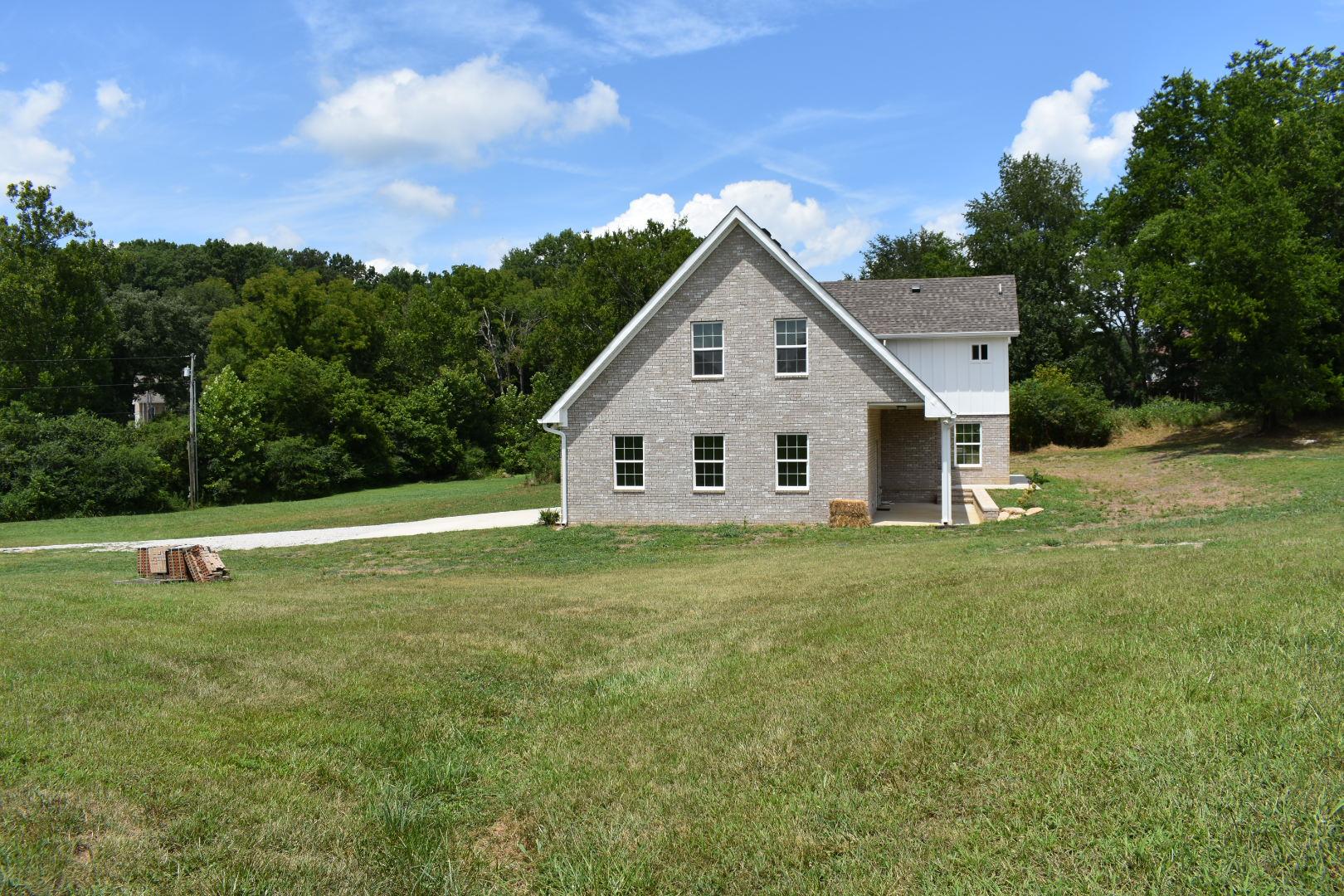 2107 Double Branch Road Columbia, TN 38401 - Photo 25 of 29 a view of a house with a yard