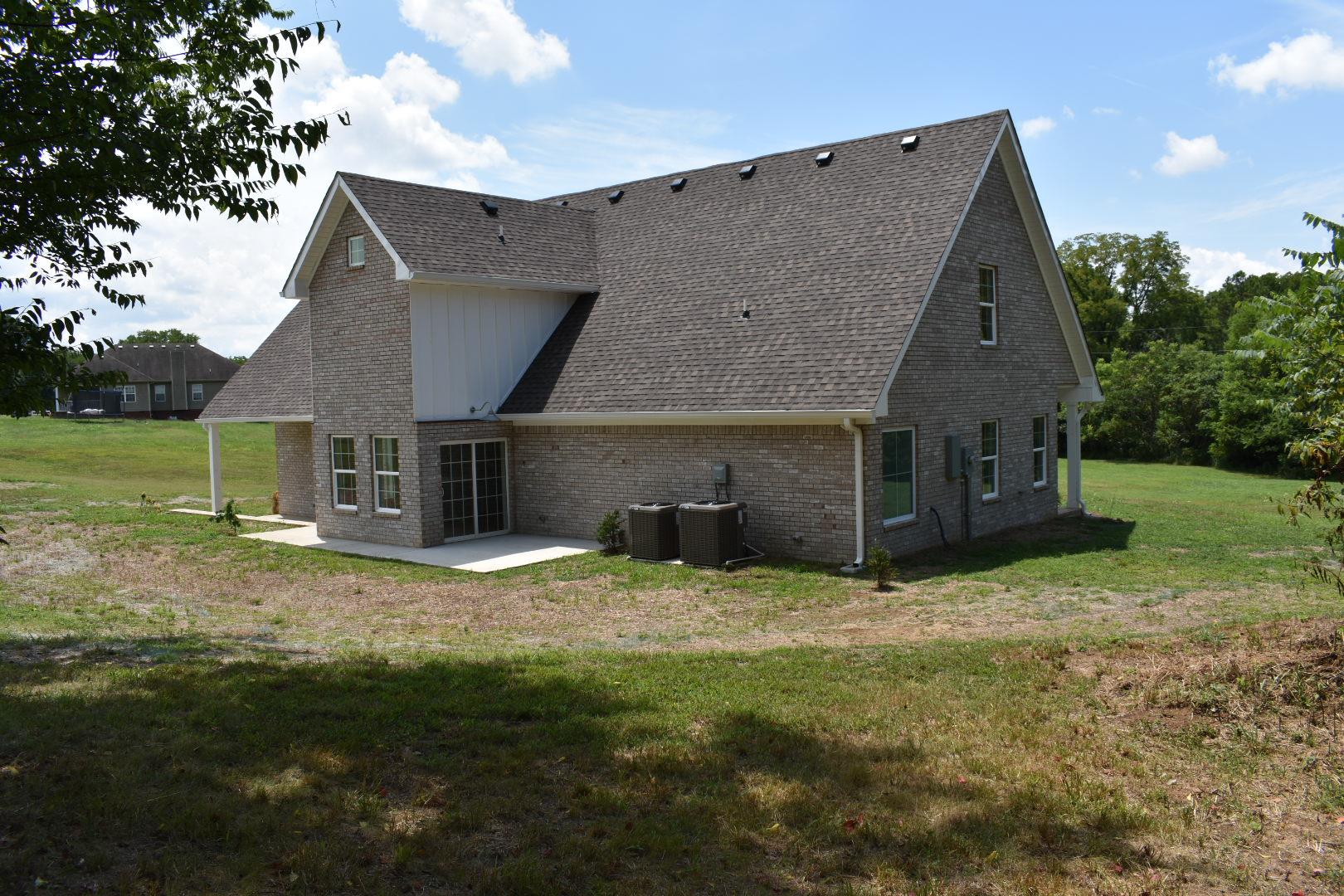 2107 Double Branch Road Columbia, TN 38401 - Photo 28 of 29 a view of a house with a yard
