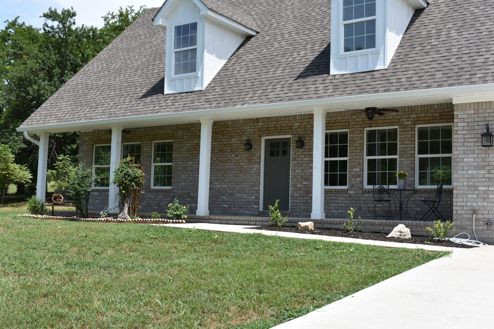 2107 Double Branch Road Columbia, TN 38401 - Photo 3 of 29 a front view of a house with yard and porch