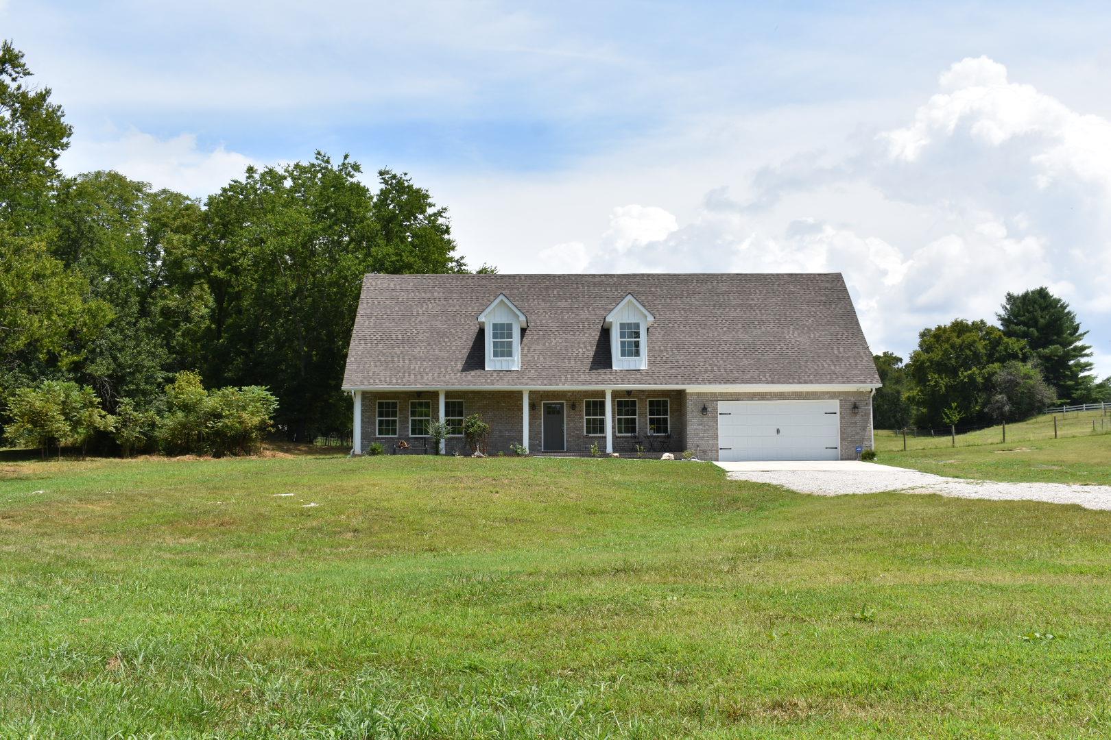 2107 Double Branch Road Columbia, TN 38401 - Photo 4 of 29 a view of a house with a big yard and large trees