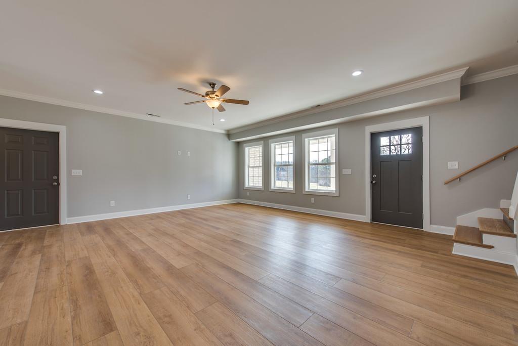 2107 Double Branch Road Columbia, TN 38401 - Photo 8 of 29 a view of an empty room with window and wooden floor
