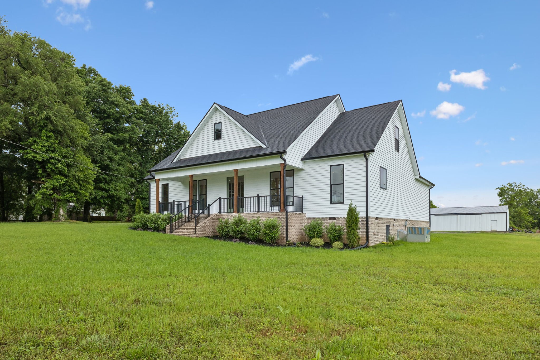 777 Rock Springs Road Castalian Springs, TN 37031 - Photo 3 of 52 a front view of a house with garden