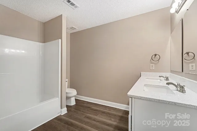 a bathroom with a sink and a toilet