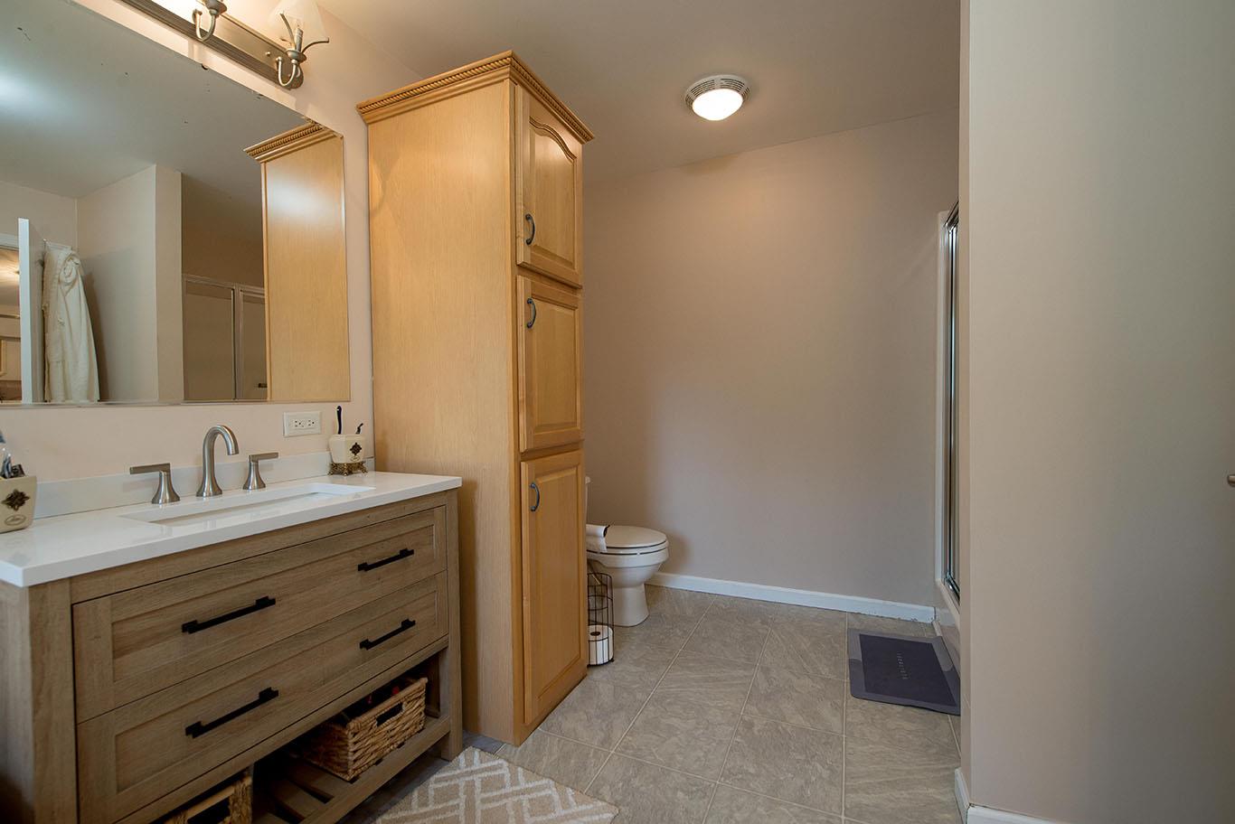 16 Kukas Road Monticello, NY 12701 - Photo 28 of 47 a bathroom with a granite countertop sink toilet and shower