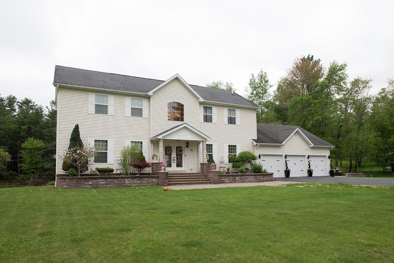 16 Kukas Road Monticello, NY 12701 - Photo 47 of 47 a front view of a house with a yard