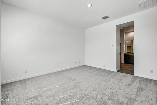 an empty room with an entryway
