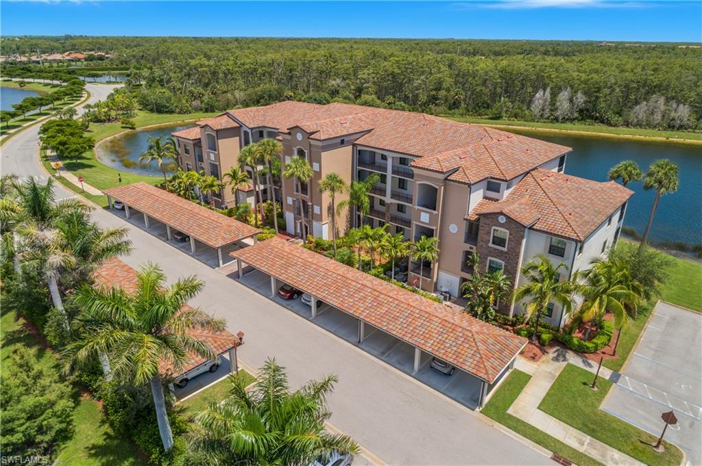 9554 Trevi Court, Unit 4727 Naples, FL 34113 - Photo 29 of 50 an aerial view of a house with a garden