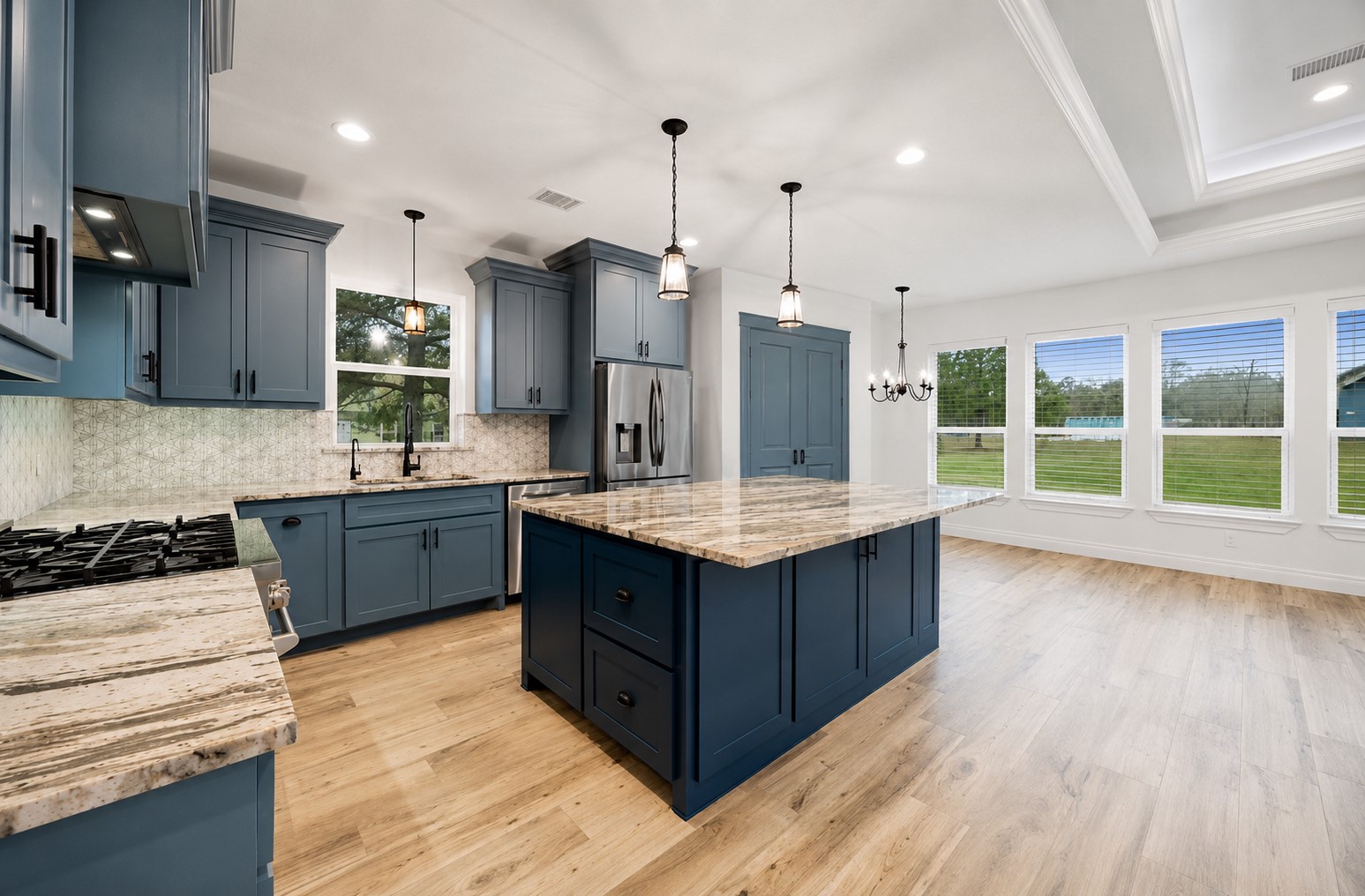 9115 Bush Buck Lane Conroe, TX 77303 - Photo 3 of 45 renderings show renovation possibilites to add a pantry to the existing kitchen.
